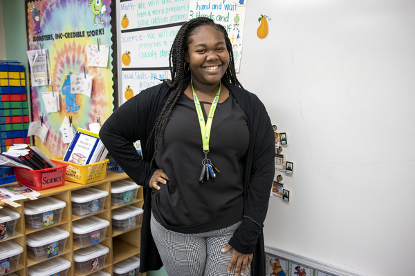 Student teacher by whiteboard